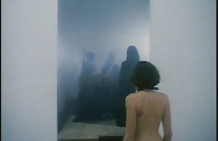 A pair of actors portrays primal sex in front of the director