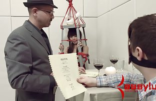 Luxurious courtesan in stockings serves the client with a royal blowjob