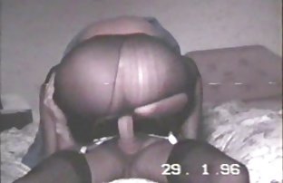 Double penetration into slender redhead in black stockings