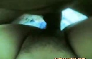 Arab prostitute in a hotel room satisfies all customer holes